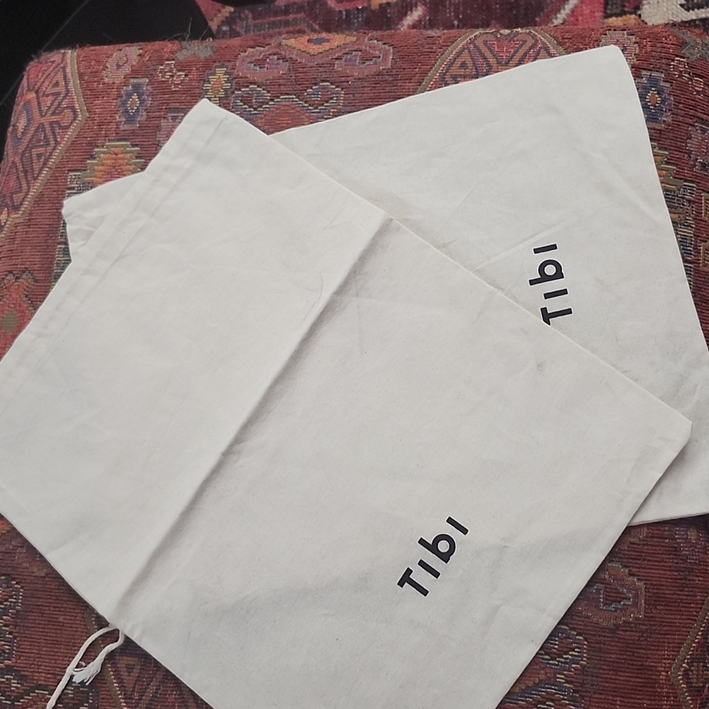 Two Tibi dust bags